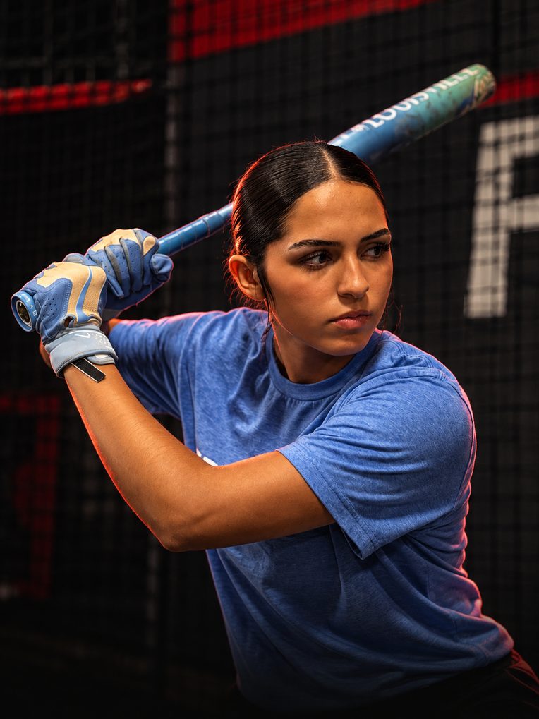 SFS hitter loaded with her bat inside the SFS facility